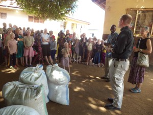 Block and Rheim deliver food to albino compound